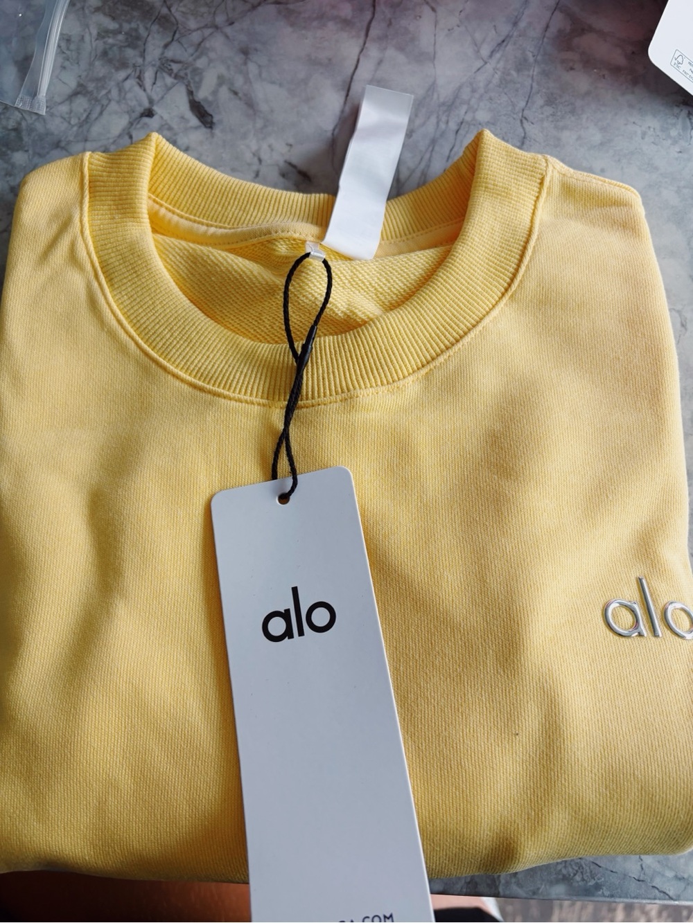 ALO Yoga Cropped Crewneck Sweater in Pale Yellow